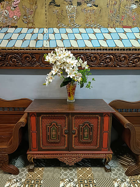 istock Orchid Bouquet on Antique Indonesian Cabinet 2244110430