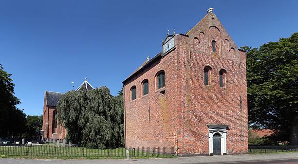 Historic brick church at the village Siddeburen Groningen. Ancient building