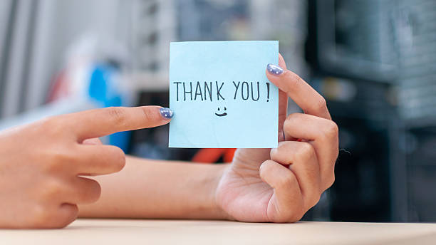 istock Expressing gratitude thank you note office setting casual environment close-up view 2244114168