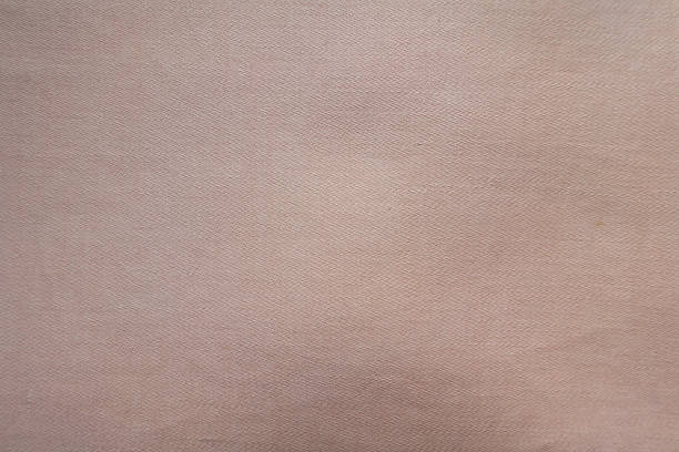 istock Top view of unprinted muted pink ticking fabric 2244114429
