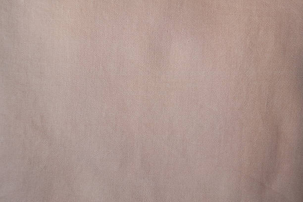istock unprinted muted pink ticking fabric from above 2244114434
