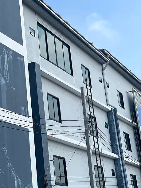 istock the facade of an old building with blue sky 2244117403
