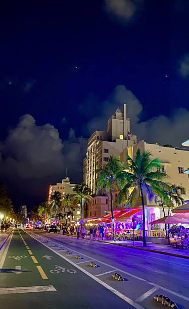 istock Nightlife on Ocean Drive Miami with Neon Lights and Palm Trees 2244119087