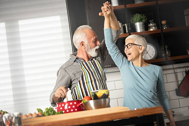 istock Kitchen, dancing and senior couple with love, 2244120349