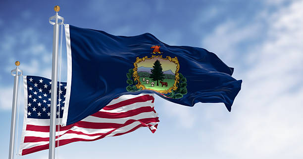 istock Vermont and the american flags waving in the wind 2244120419