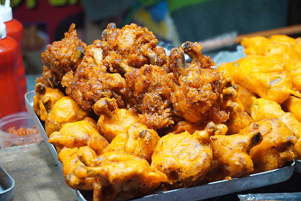 istock Crispy fried chicken pakora piled in a tray 2244125442