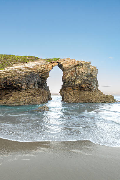 istock Rock arches on Las Catedrales Beach, Galicia 2244125925
