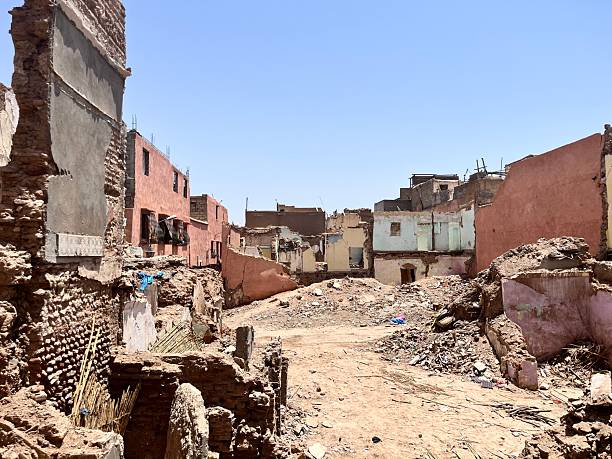 Marrakech Toualat Berrima street showcasing the aftermath of building demolitions, with rubble and partially standing structures creating an impression of urban decay and abandonment in Morocco