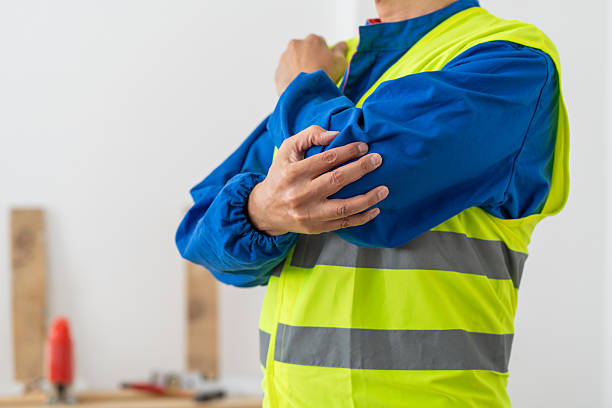 istock worker with elbow pain at the workplace 2244134909