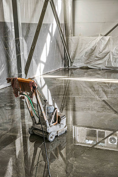istock A close-up of a tool for leveling liquid self-leveling floors at a construction site during the construction and installation of a polymer floor. 2244135317