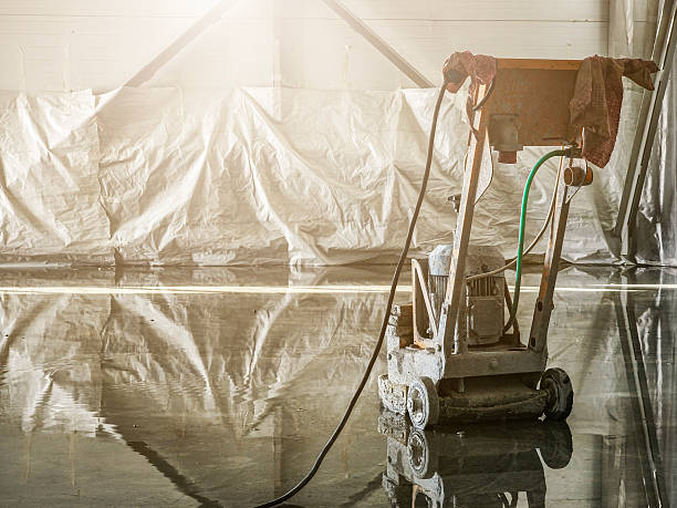istock A close-up of a tool for leveling liquid self-leveling floors at a construction site during the construction and installation of a polymer floor. 2244135319