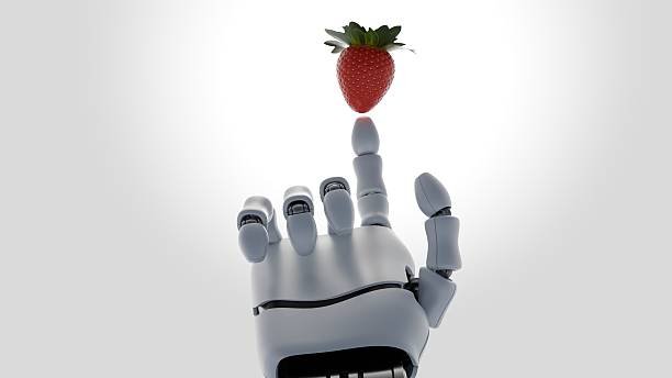 istock A 3d robotic hand's index finger pointing at floating strawberry 2244141014