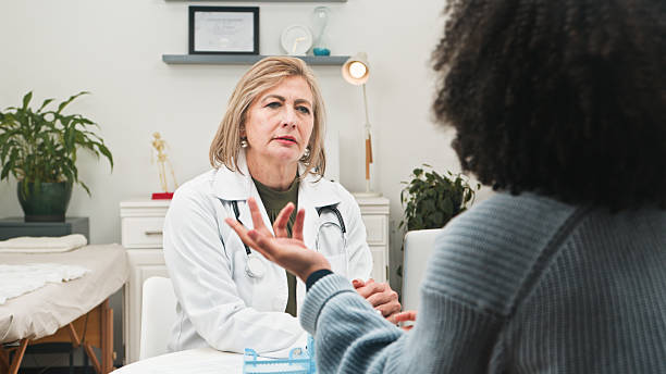 istock Compassionate Doctor Consults Patient in Modern Clinic With Stethoscope and Caring Expression During Medical Visit 2244142942