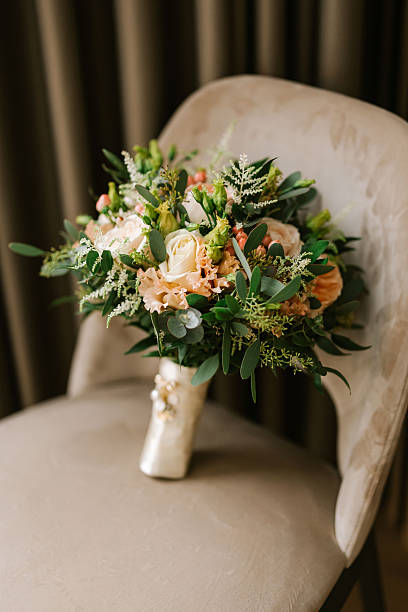 istock Bridal bouquet on elegant chair 2244146441