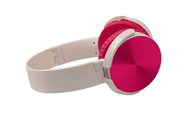 Pink and white headphones isolated on a white background.