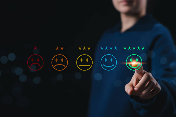istock Customer feedback and satisfaction concept. Person selecting five-star happy face rating from digital smile scale, symbolizing positive user experience, evaluation, service quality and market research 2244154365