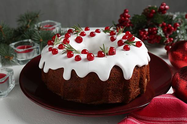 istock Traditional classic Christmas cake and decor on white table, closeup 2244154939