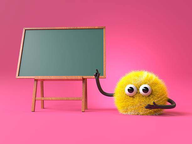 istock Fluffy, cute monster points to a blank chalkboard 2244156671