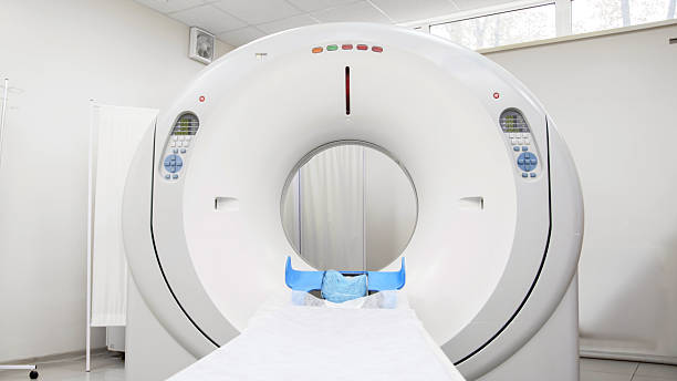 istock CT scanner in a modern medical facility, featuring a sleek design and advanced technology, ready for x-ray diagnosis and tomography procedures with copy space 2244162701