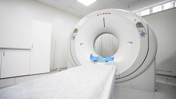 istock CT scanner in a modern medical facility, featuring a sleek design and bright lighting, ready for x-ray diagnosis and tomography procedures in a clinical environment 2244162716