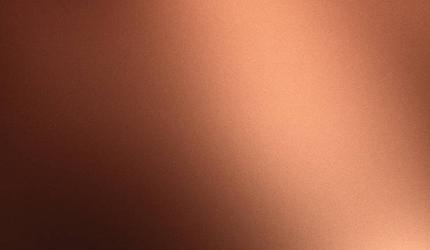 istock Grainy polished copper foil texture matte blurred gradient bronze metal abstract background 2244164380
