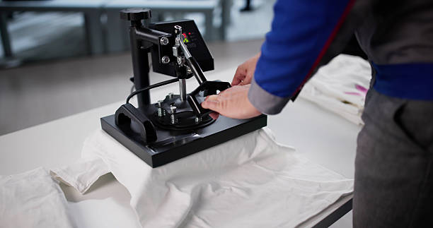 istock Designer Man Pressing Custom Digital Print T-Shirt Heat Transfer 2244166617