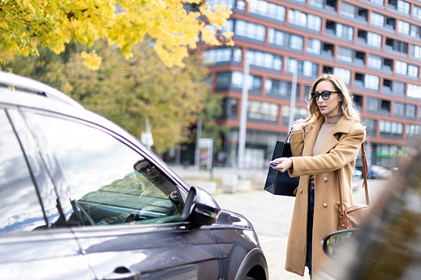 istock Woman opening a car 2244168477