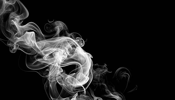 istock Swirling pattern of white smoke against black background creates mysterious and ethereal atmosphere 2244170703