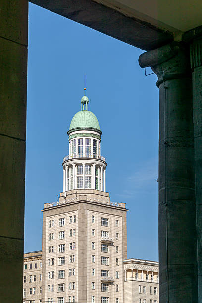 Germany, Berlin, Friedrichshain, Frankfurter Tor, October 29, 2025 - Residential tower at Frankfurter Tor between two pillars