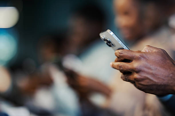 istock Person holding smartphone checking social media apps 2244174621