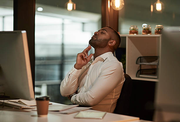 istock Thoughtful Businessman At His Desk In A Modern Office Setting During Workday 2244180083