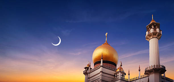 istock Islamic Mosque sunset dramatic sky, crescent moon, holy night. Islamic night and mosque wallpaper. Ramadan or Eid Islamic night sunset 2244180754