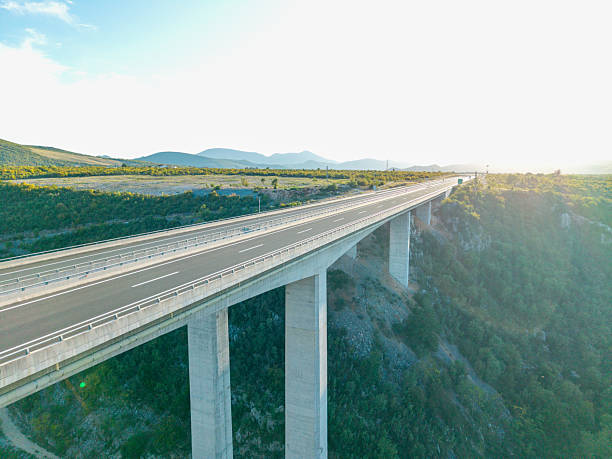 istock Elevated Highway Bridge Crossing Green Valley 2244182025