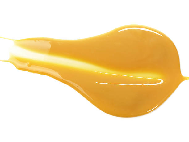 istock Food - Toffee Splash on white Background 2244185145