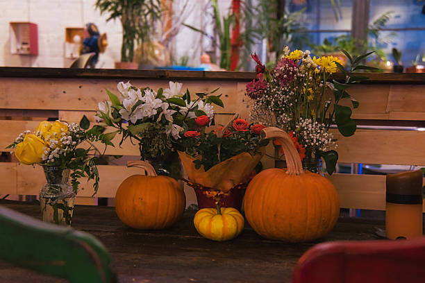 istock Halloween pumpkin and flowers 2244188528