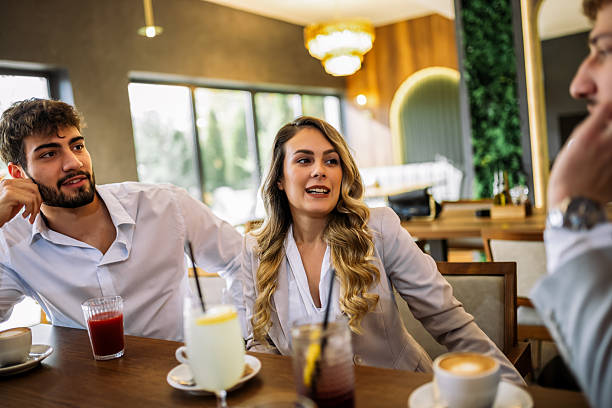 istock Friends enjoying drinks at fancy restaurant 2244189372