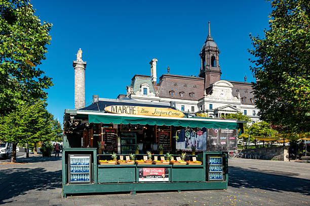 Smoothie kiosk on Place Jacques Cartier in Old Montreal, Quebec, Canada, on a sunny day.