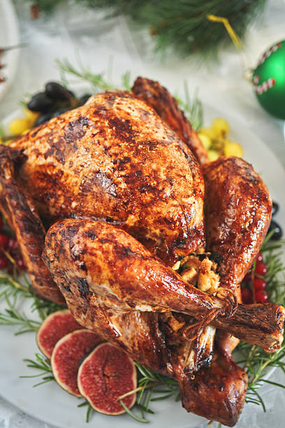 istock Roasted Holiday Turkey with Vegetables for Christmas Dinner 2244191814