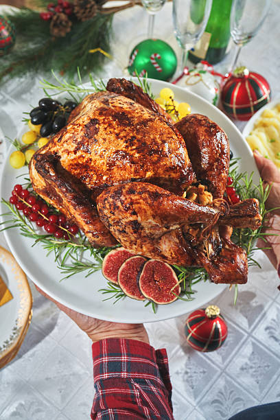 istock Roasted Holiday Turkey with Vegetables for Christmas Dinner 2244191850