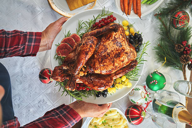 istock Roasted Holiday Turkey with Vegetables for Christmas Dinner 2244191892