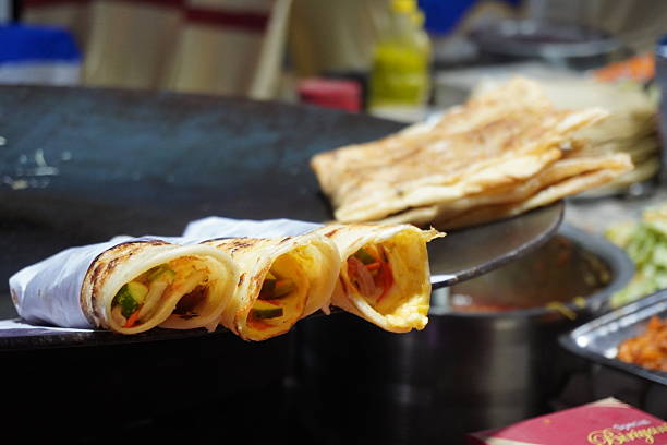 Sizzling Indian Street Food Wraps on Hot Griddle