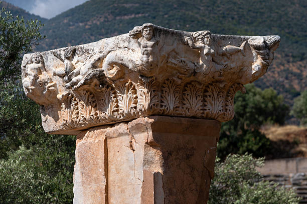 A detailed marble relief from the ancient city of Nysa shows mythological figures carved in high relief. Decorative acanthus motifs support dynamic human and animal forms, revealing the fine craftsmanship and artistic richness of the ancient site.