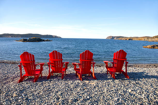 Canada Newfoundland Twillingate. red chairs for tourist s