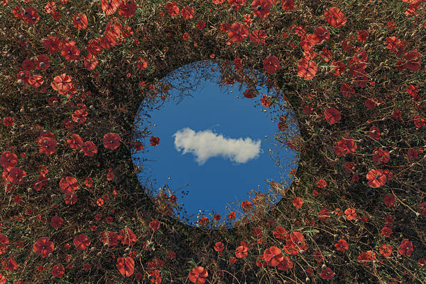 istock 3D Rendering of circular mirror reflecting single white cloud an 2244202439