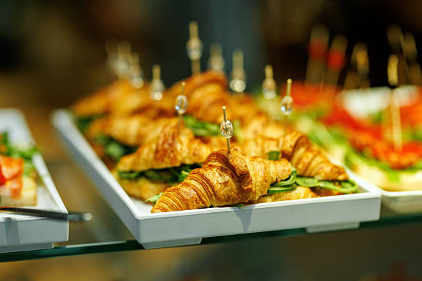 istock Croissant sandwiches with spinach and cheese served on tray 2244204355