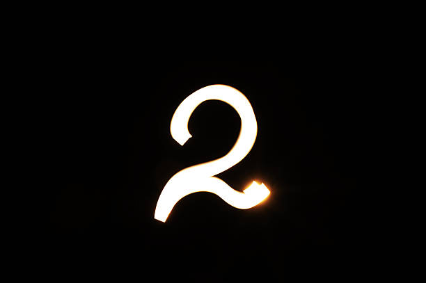 istock Light Painted Number 2 Romantic Symbol for Love, Couples, and Valentine s Day 2244205898
