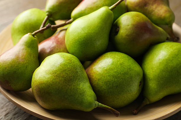 istock Many fresh ripe pears on table, closeup 2244208628