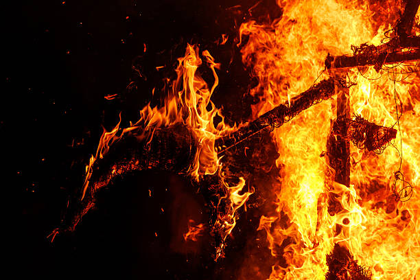 istock Wooden effigy burning in flames at night 2244210227
