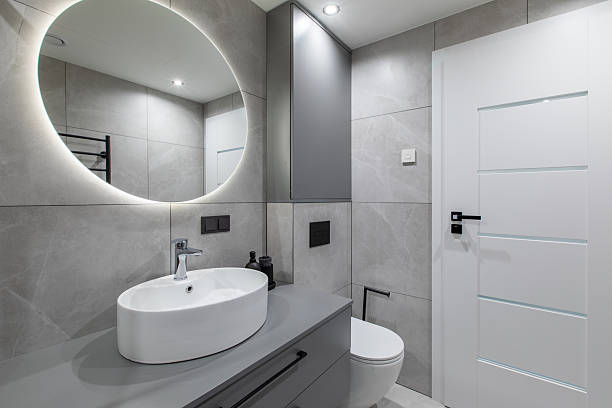 istock Modern Home Bathroom Design With Round Mirror and Minimalist Interior Decor 2244210716
