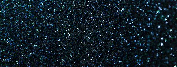 istock Dark blue sparkling background from small sequins, macro. Shiny navy glitter backdrop for Christmas or New Year 2244210872
